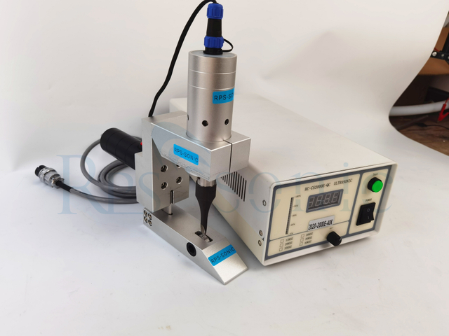 Compact Ultrasonic cutting machine for cutting of fabrics, non-woven materials, foils, Butyl Rubber 